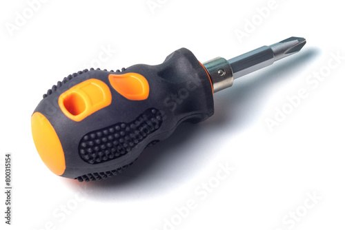 Phillips screwdriver with short orange and black rubberized handle isolated on a white background, close-up macro view