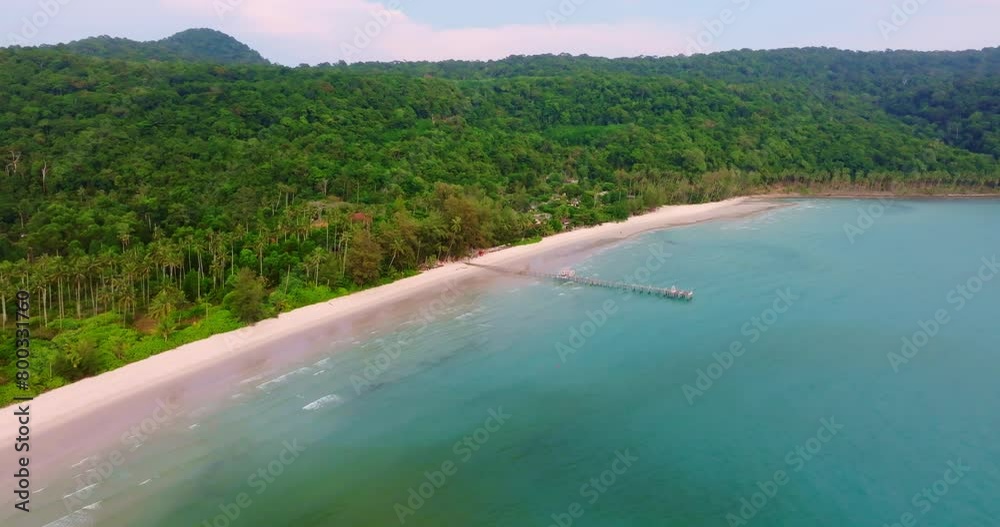 Aerial drone view of the tropical beach with clear turquoise sea, white sand and palm tree. Aerial drone view of the tropical beach with clear turquoise sea, white sand and palm tree.
