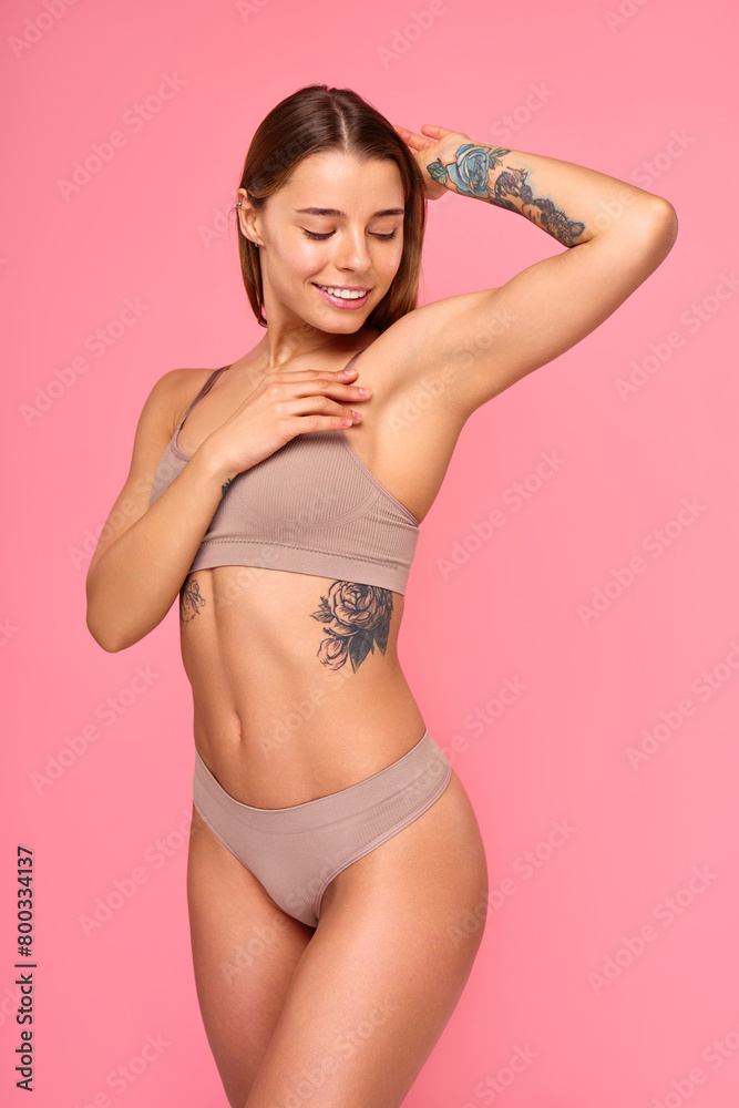 Obraz premium Cosmetology, beauty and spa treatment. Woman in lingerie on pink background.