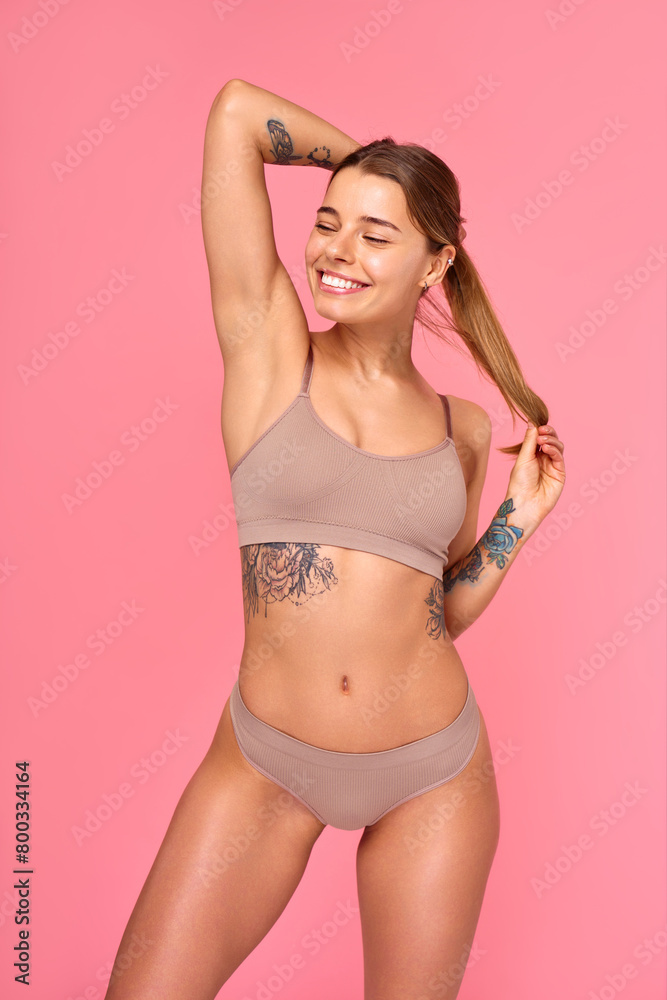 Obraz premium Cosmetology, beauty and spa treatment. Woman in lingerie on pink background.