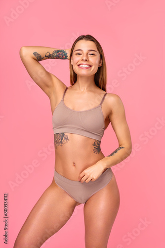 Cosmetology, beauty and spa treatment. Woman in lingerie on pink background. © Valerii Apetroaiei