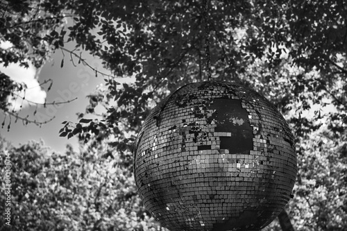 Discokugel - Disco Ball - Silver  - Hanging  - Outdoor - Concept - Background - Party - Glittering  - Reflection - Lights - Tree - Shiny - Mirror - Reflector - Celebration