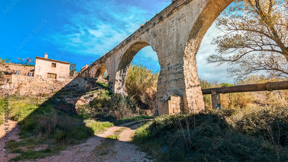 A Sunny Sojourn: Embark on a Hiking Adventure along Riverside Trails near Calanda, Teruel, Immersed in Nature's Tranquility and Charm.






