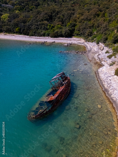 Sunken old boat on the beach