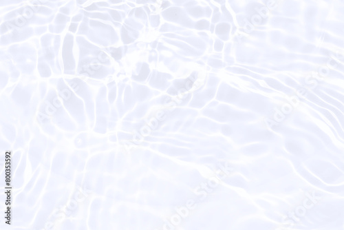 Abstract water background with ripple. White water texture background. white water waves effects. Closeup of transparent white clear water. Summer light background. For cosmetic moisturizer background photo