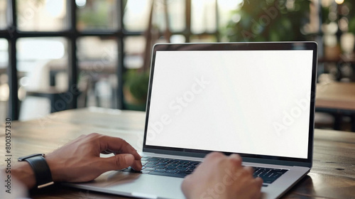 Business person working online or learning using laptop mock up blank white empty screen, hands typing on computer background close up view. Mockup display for ads. Close up view.