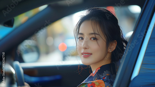 SMEs , Start up , Fashion young businesswoman in Luxury Kimono sitting in the car with a smile