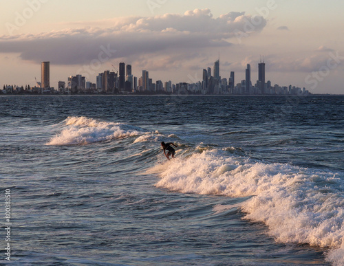surfing city sunset