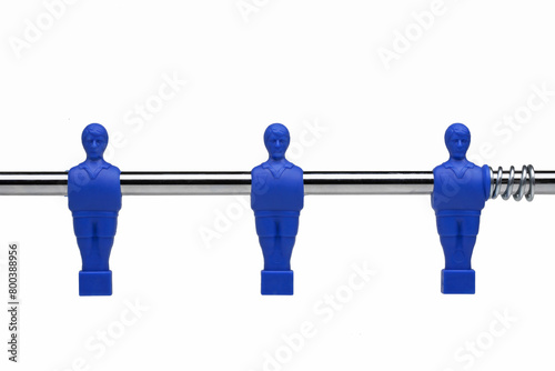 Foosball figures (table soccer or table football)  on white background