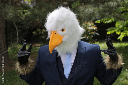 Businessman with an eagle face 