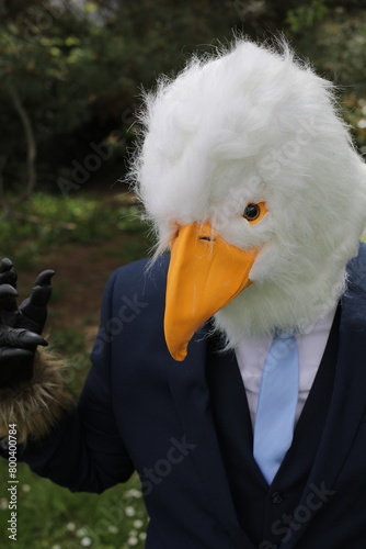 Businessman with an eagle face 