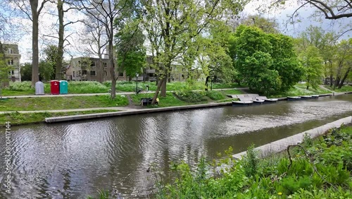 Utrecht Netherlands, City caputred on a sunny day with clouds. Utrecht city center river and channels with green trees photo