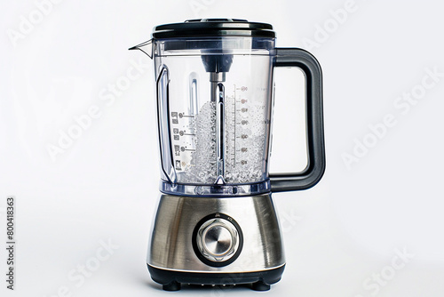 A blender with a powerful motor and stainless steel blades isolated on a solid white background. © soman