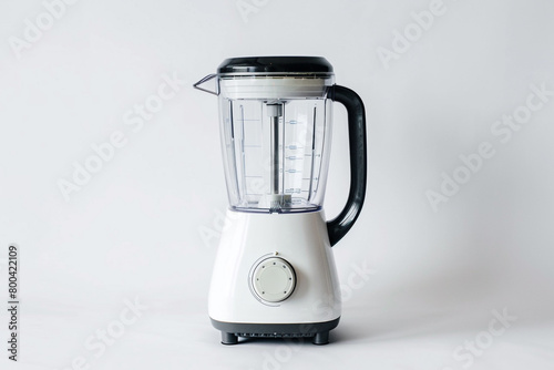A blender with a removable blade assembly and a secure locking mechanism on the blending jar isolated on a solid white background.