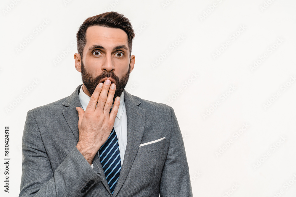 Scared young businessman hearing bad news isolated over white background. Caucasian sad shocked manager banker is afraid, fears, silent unspoken muted Scared young businessman hearing bad news isolated over white background. Caucasian sad shocked manager banker is afraid, fears, silent unspoken muted