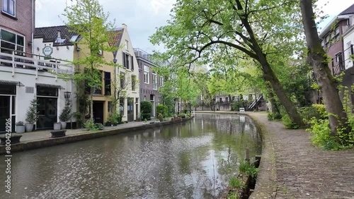 Utrecht Netherlands, City caputred on a sunny day with clouds. Utrecht city center river and channels with green trees
