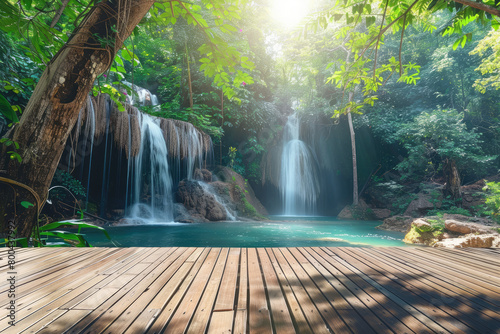 a wooden platform in front of a waterfall with a waterfall in the background