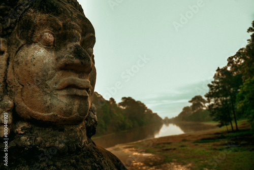 Stone Buddha Head in the temple Angkor Wat.