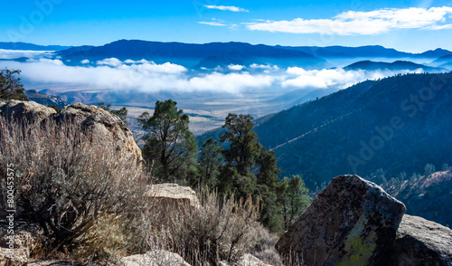 Beautiful mountain scenery on the background of clouds, layers of mountains on the horizon, Sierra Nevada Mountains, California, USA photo