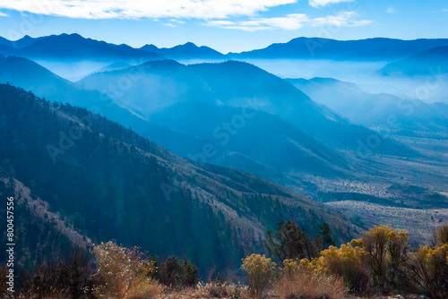Beautiful mountain scenery on the background of clouds, layers of mountains on the horizon, Sierra Nevada Mountains, California, USA photo