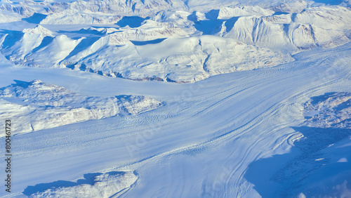 Aerial panoramic view of the glacier in Greenland during the flight from Europe to the United States. © thecolorpixels