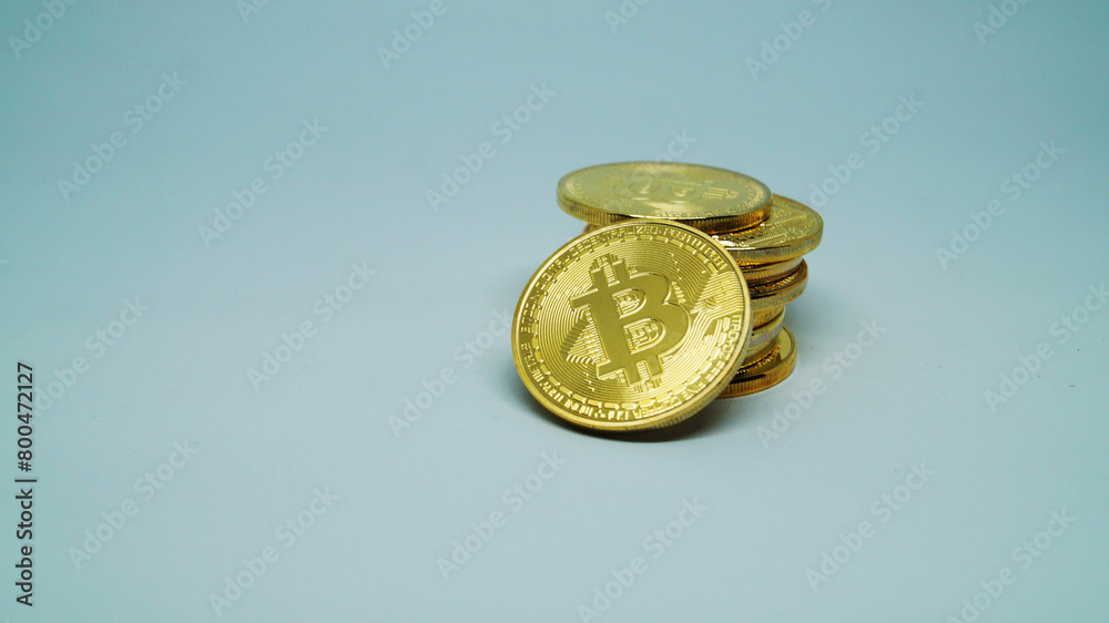 Cryptocurrency golden coins - Bitcoin on white background. Virtual money concept.