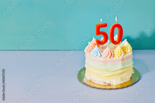50th birthday cake celebrating 50 years on an isolated, colorful pastel background