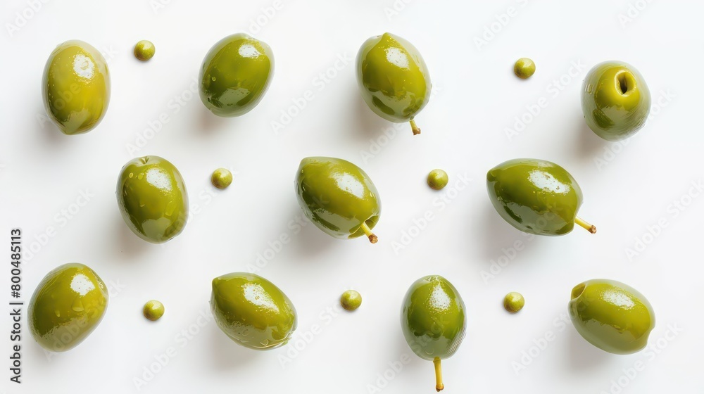 green olives scattered on a neutral background green olives scattered on a neutral background