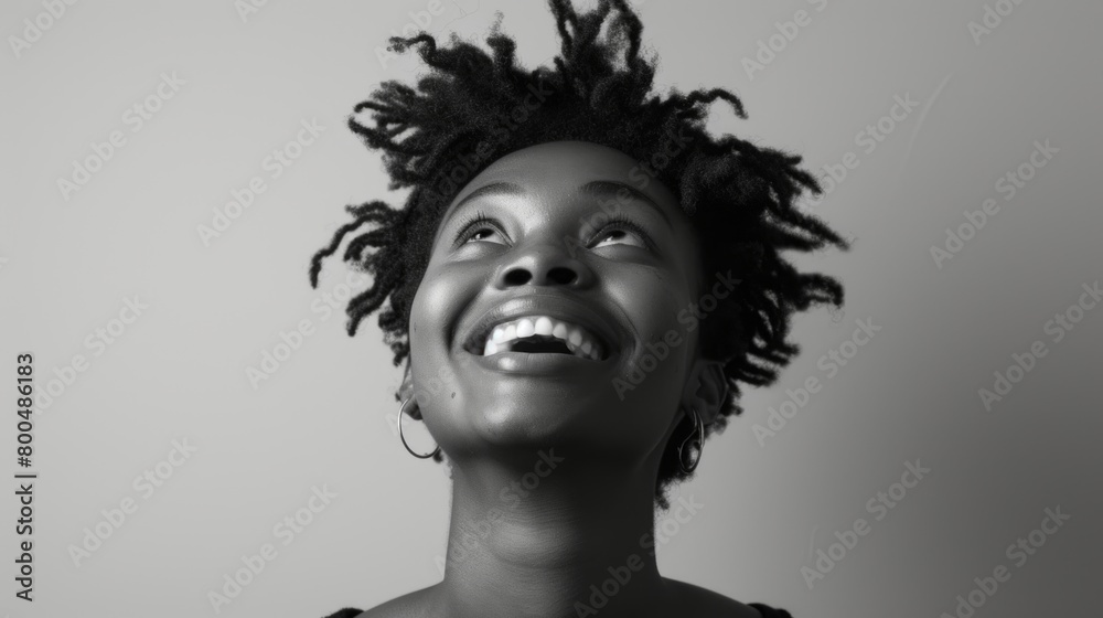 Joyful woman laughing in black and white portrait. Joyful woman laughing in black and white portrait.