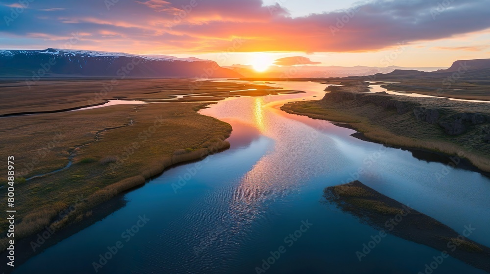 Sunset view River flowing through valley.