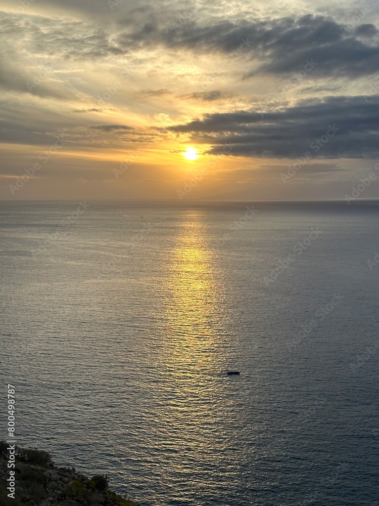 Obraz premium Sunset over the Atlantic Ocean from Mirador de Las Americas near Los Cristianos, Tenerife, Spain, March 2023