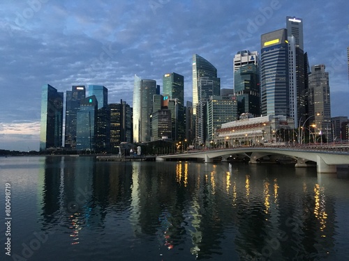 Singapore skyline and the Esplanade bridge at night reflected in Marina Bay  Singapore  February 2019