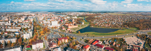 Lida, Belarus. Aerial Bird's-eye View Of Cityscape Skyline. Lida Castle In Sunny Autumn Day. Famous Popular Historic Landmark. Panorama