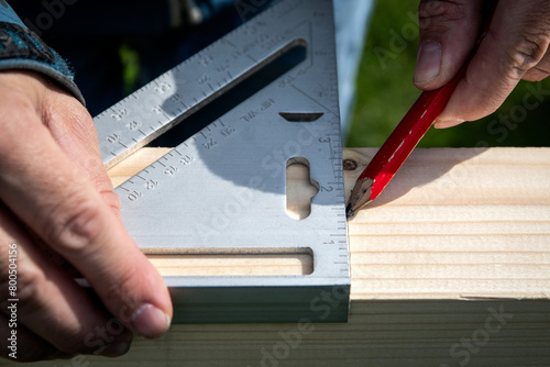 Carpentry work, angle measurements on wood. Carpenter's triangle © STOATPHOTO