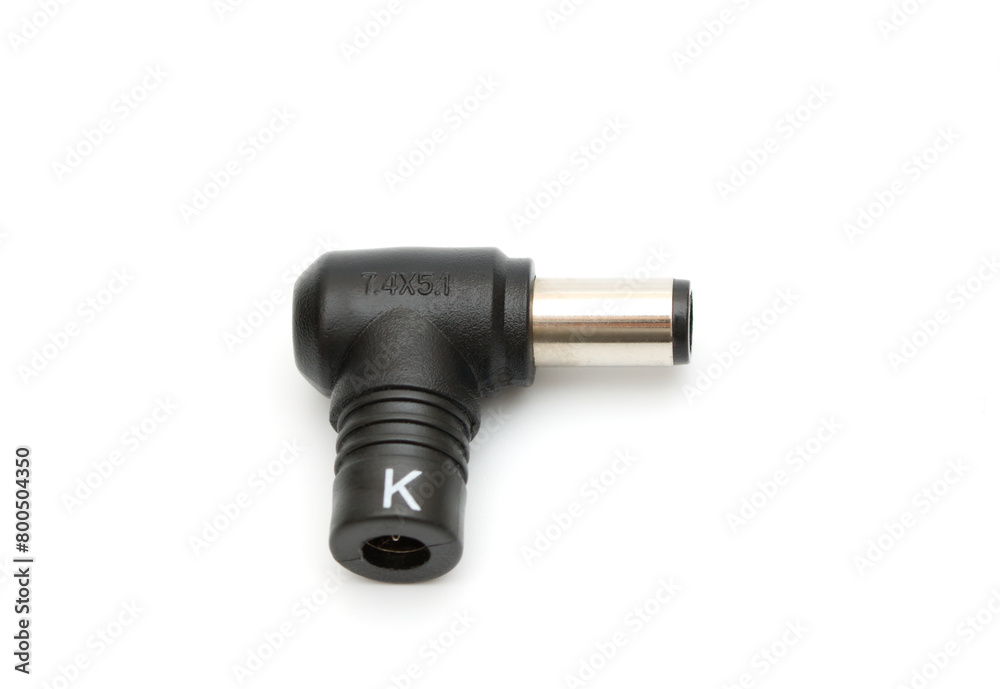 DC power supply connector for low current devices. Power plug of router isolated on white background. DC power supply connector for low current devices. Power plug of router isolated on white background.