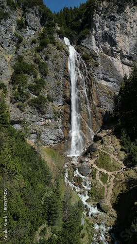 View to the dalfazer Waterfall with forest landscape and the Achensee as a close neighbor photo