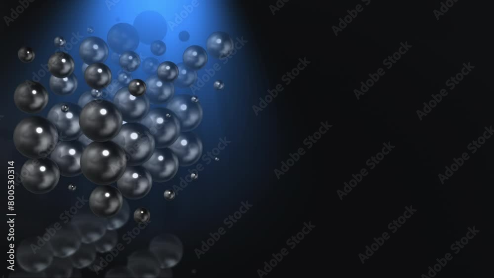 Abstract 3D animation loop of reflective spheres rotating and changing size, with copy space.