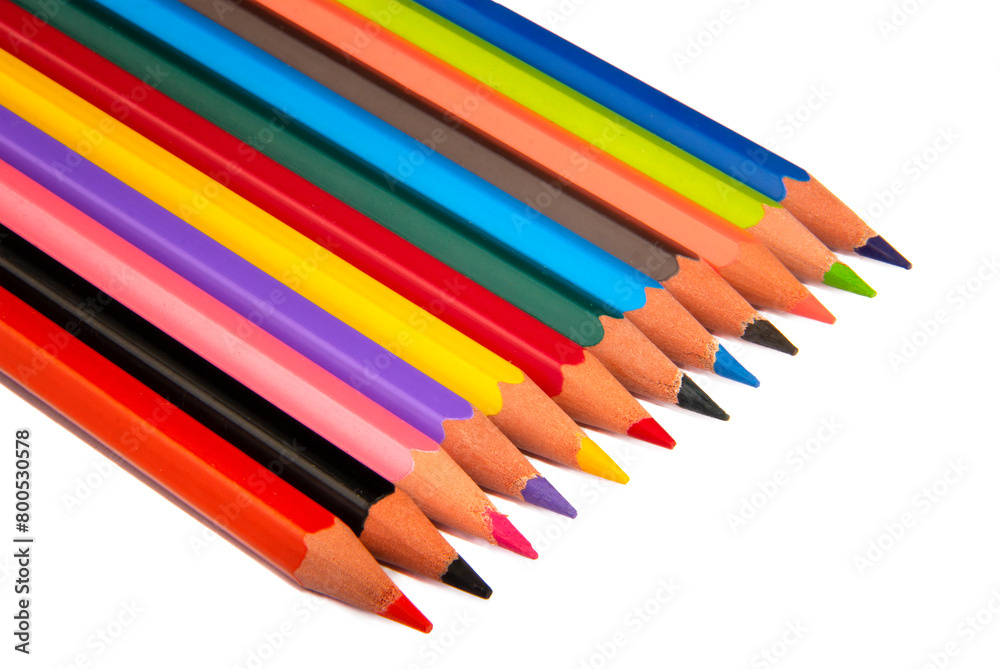 A rainbow of colorful pencils, isolated on a white background.