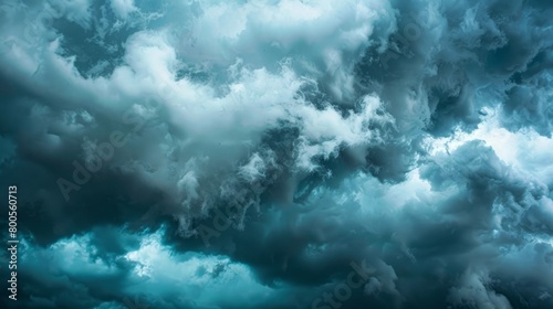 A dramatic scene of intense black clouds gathering before a thunderstorm, creating a moody and ominous atmosphere.