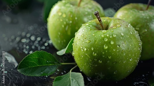 A close-up image of ripe green apples, showcasing their freshness and vibrant color.