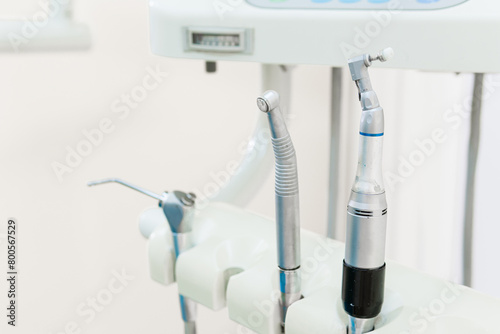 Dentist workspace with modern chair, equipment and instruments