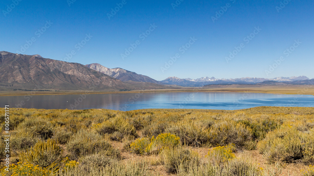 a panoramic overlook over the famous Crowley lake at a bright sunny summer day in California 