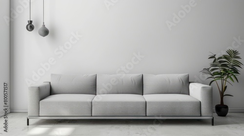Elegant modern grey sofa in a minimalistic white living room  embodying contemporary design and comfort