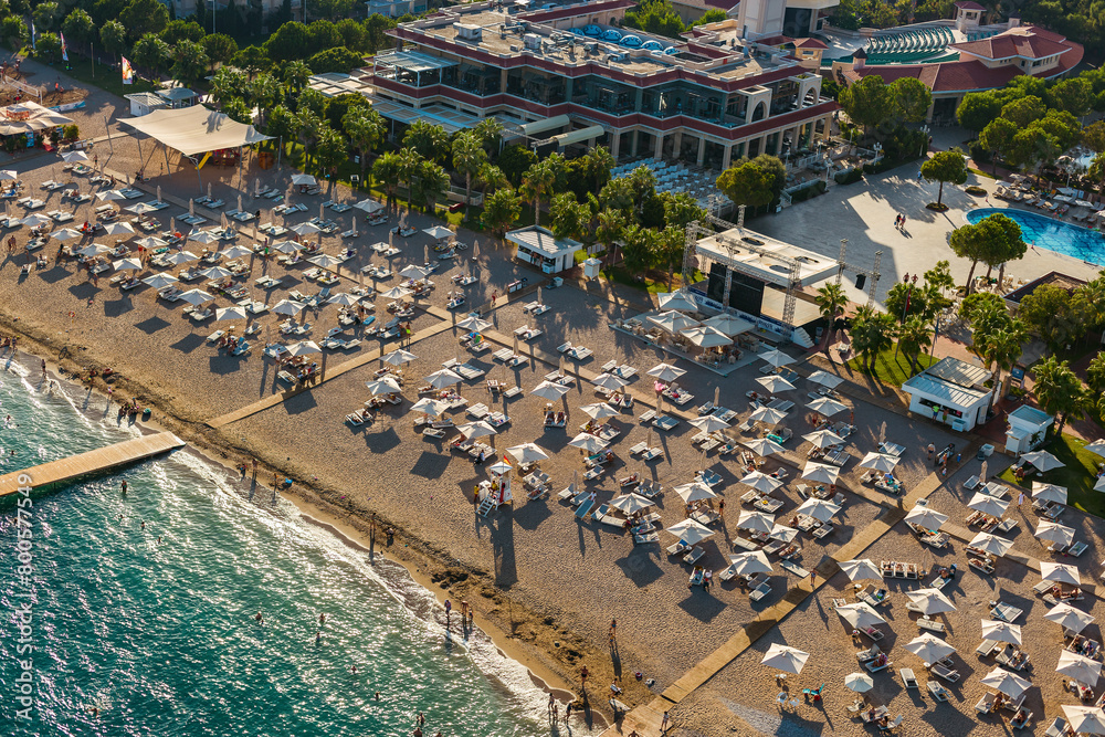 An aerial view of a bustling sandy beach resort in Turkey An aerial view of a bustling sandy beach resort in Turkey