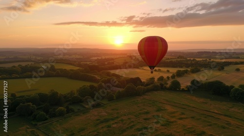 A tranquil aerial view of a picturesque countryside with a hot air balloon drifting gracefully through the sky  offering a serene mode of travel.