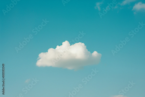 A single bright cloud in a clear sky, symbolizing the optimism and vision required in leadership 
