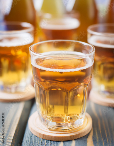 Close-up of glass of cider. Alcoholic beverage. Tasty drink. Blurred background.