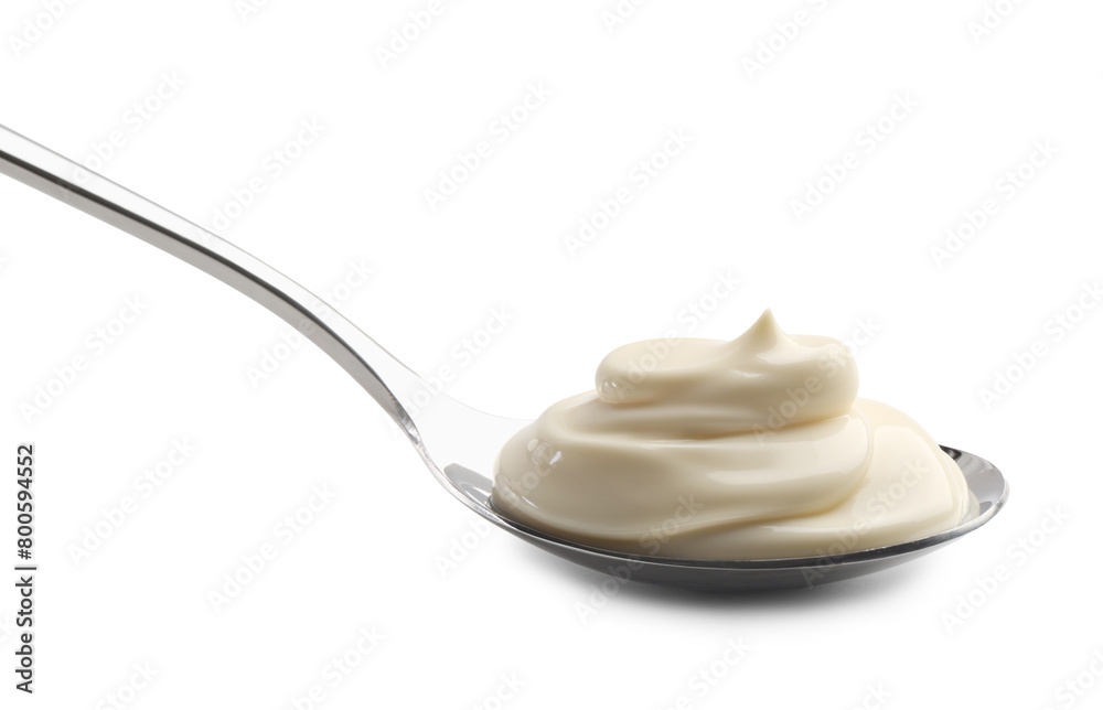 Natural yogurt in spoon isolated on white