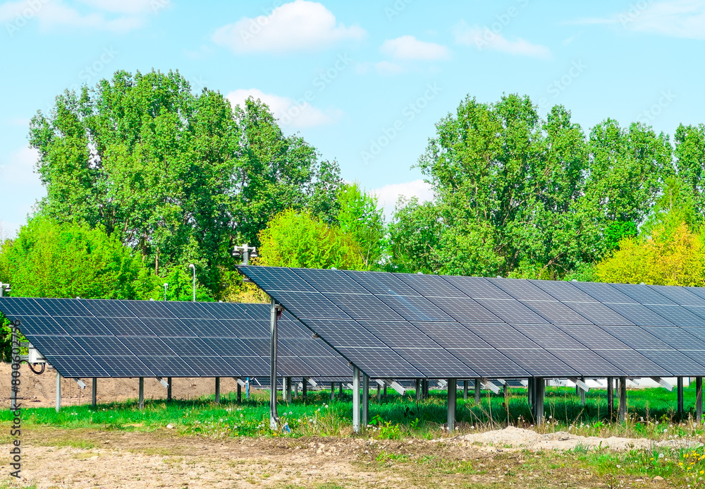 Solar panels installed in a residential housing estate. Green energy for the residents, promoting sustainability and renewable resources Solar panels installed in a residential housing estate. Green energy for the residents, promoting sustainability and renewable resources
