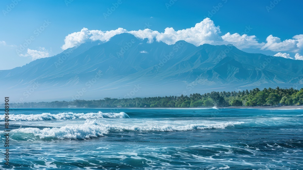 A serene beachscape with towering mountains in the background and calm waves washing ashore, promoting tranquility
